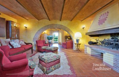 Landhuis te koop Asciano, Toscane:  RIF 2992 Wohnbereich mit Kamin