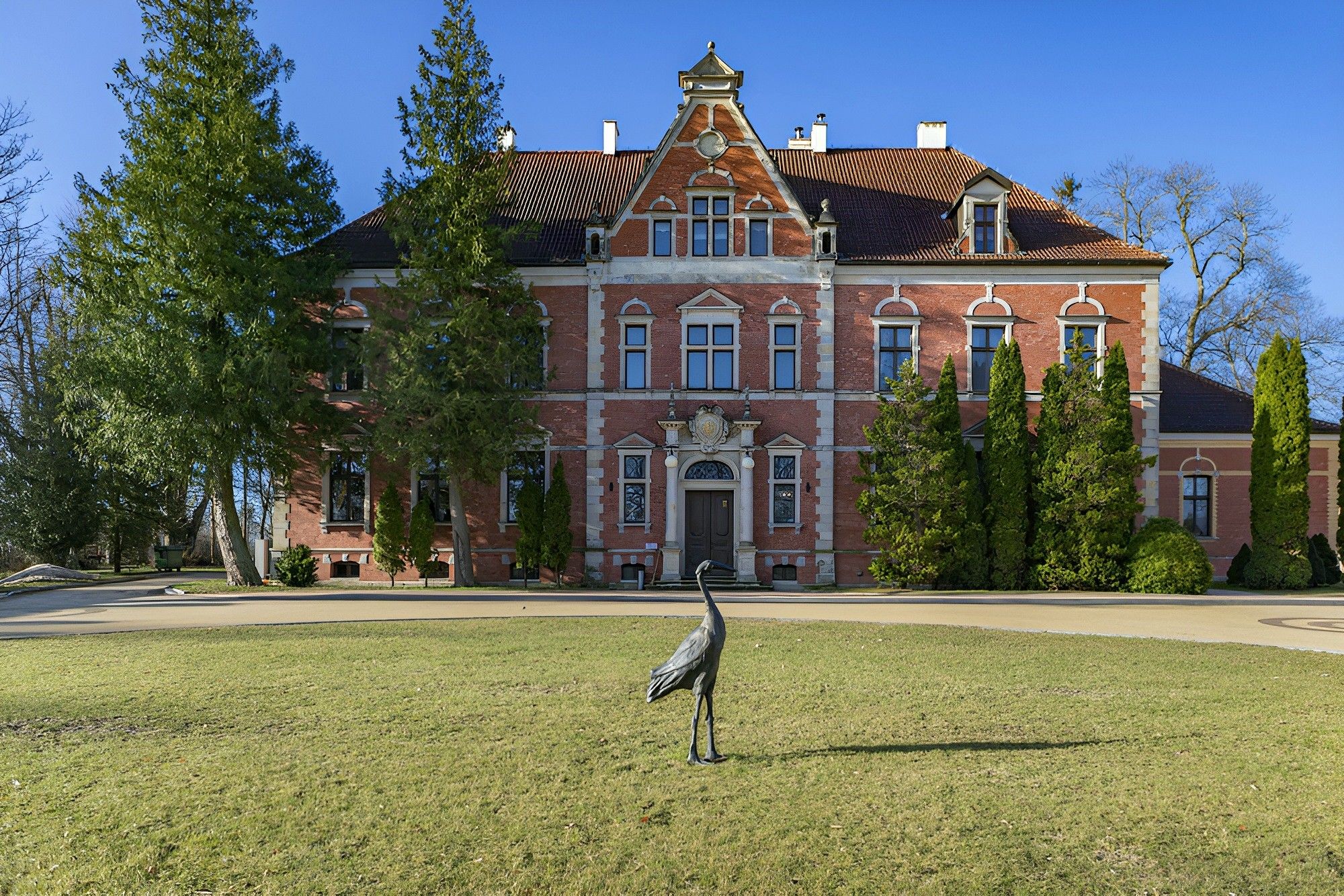Bilder Herregård med park og uthus nær Østersjøen