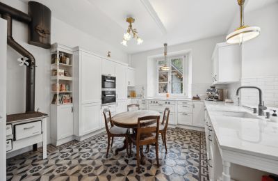Historisk villa kaufen Biel/Bienne, Alpenstrasse 95, Bern/Berne, Moderne trifft auf Nostalgie: Küche mit Guss-Holzofen